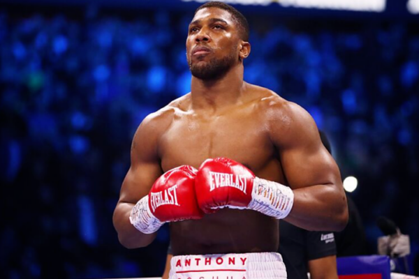 Ex-Reform UK Candidate Attacks Anthony Joshua Over ‘Third World Flag’ Comment