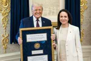Venezuela’s Machado Gives Trump Her Nobel Prize, Gets Swag in Return