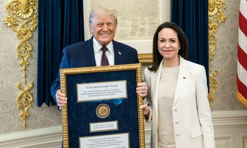 Venezuela’s Machado Gives Trump Her Nobel Prize, Gets Swag in Return