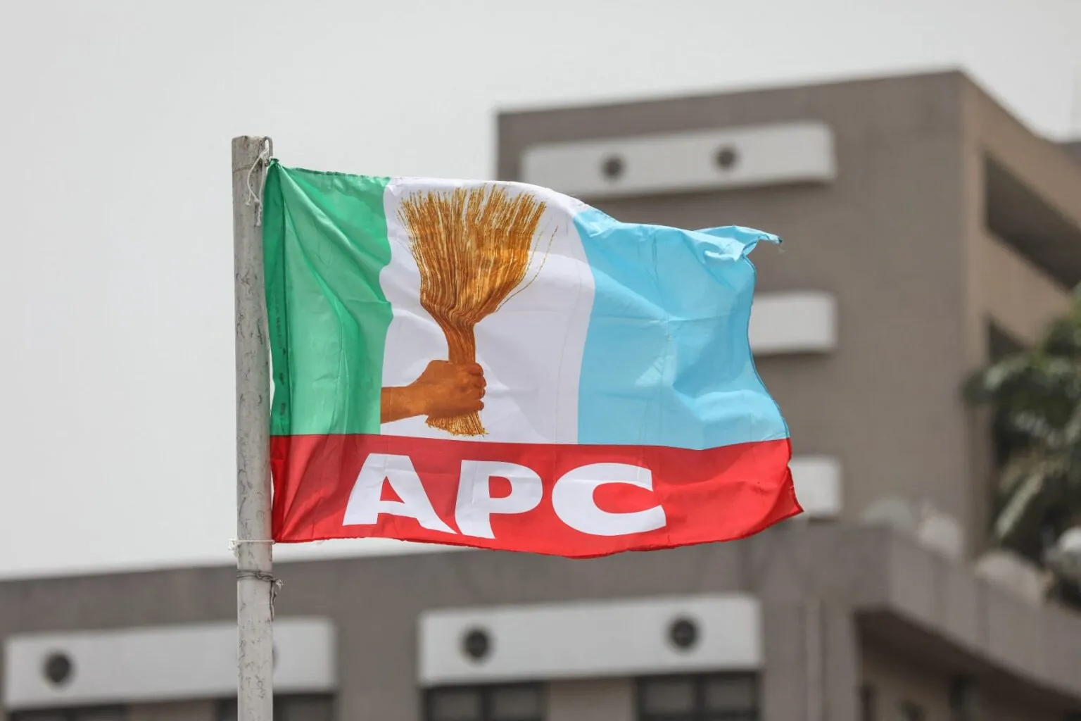 Official logo of the All Progressives Congress during a press briefing in Abuja.