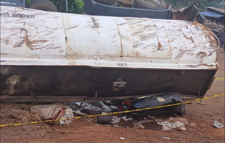 Emergency response scene in Ibadan where a tanker crushes four Micra cars along the expressway.